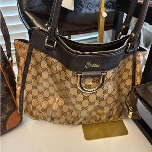 Gucci Abbey Coated Canvas